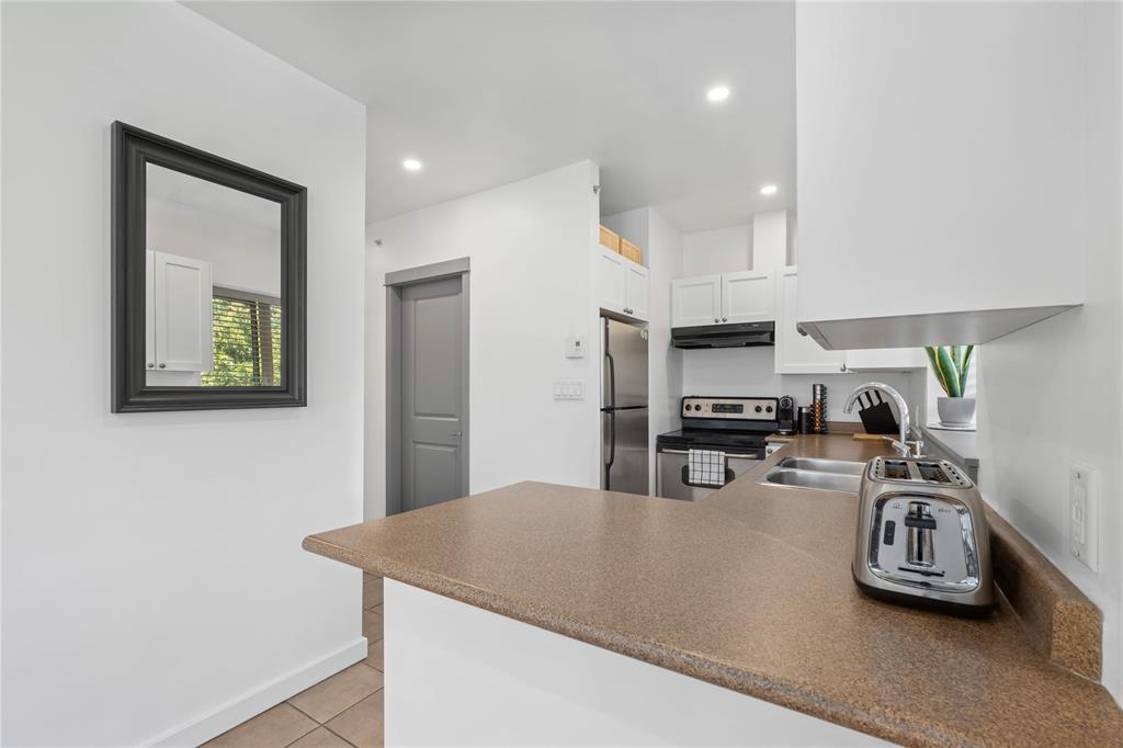 #207 – 1411 Portage Road