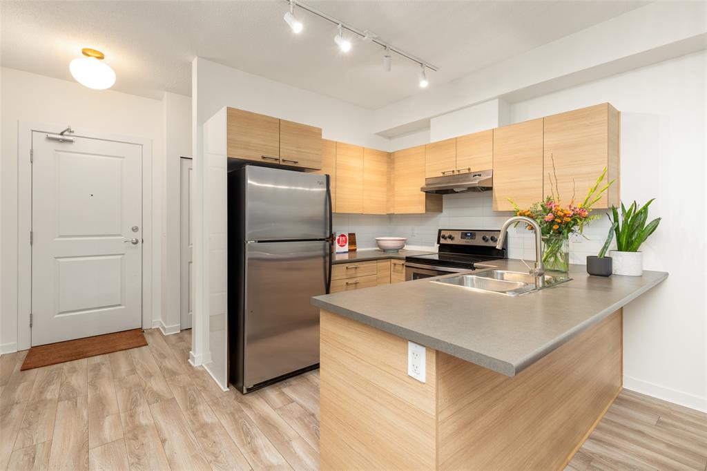 #213 – 7445 Frontier Street