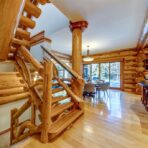 6361 Fairway Drive, interior and exterior views of this luxury log home.
