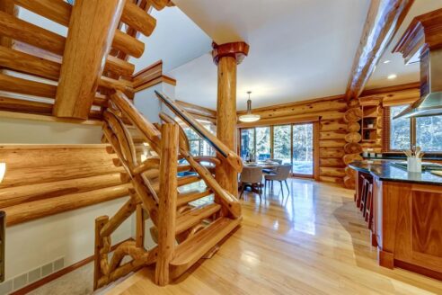 6361 Fairway Drive, interior and exterior views of this luxury log home.