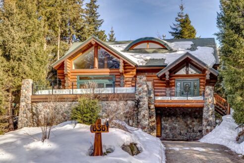6361 Fairway Drive, interior and exterior views of this luxury log home.