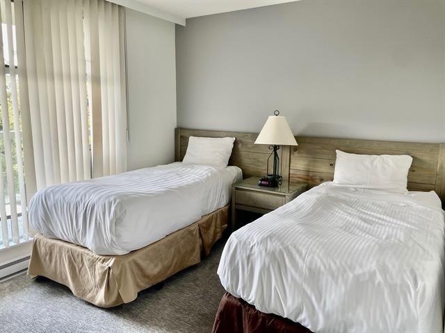 #305 – 4910 Spearhead Place