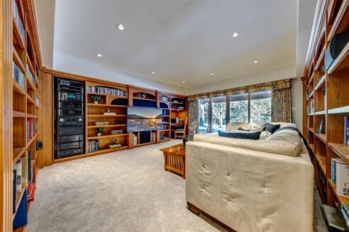 6361 Fairway Drive, interior and exterior views of this luxury log home.