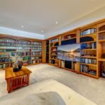 6361 Fairway Drive, interior and exterior views of this luxury log home.