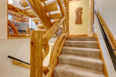 6361 Fairway Drive, interior and exterior views of this luxury log home.