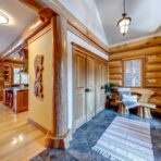 6361 Fairway Drive, interior and exterior views of this luxury log home.