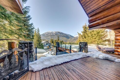6361 Fairway Drive, interior and exterior views of this luxury log home.