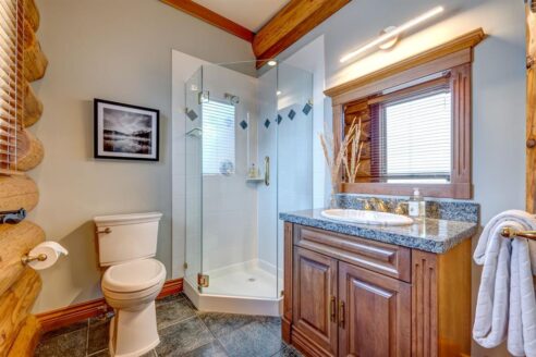 6361 Fairway Drive, interior and exterior views of this luxury log home.