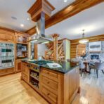 6361 Fairway Drive, interior and exterior views of this luxury log home.
