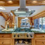 6361 Fairway Drive, interior and exterior views of this luxury log home.