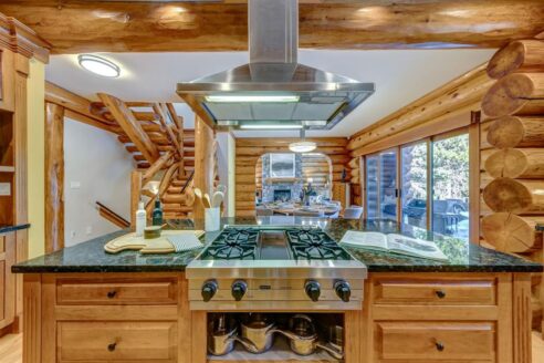 6361 Fairway Drive, interior and exterior views of this luxury log home.
