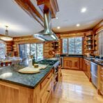 6361 Fairway Drive, interior and exterior views of this luxury log home.