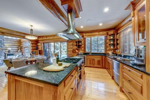 6361 Fairway Drive, interior and exterior views of this luxury log home.