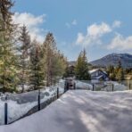 6361 Fairway Drive, interior and exterior views of this luxury log home.