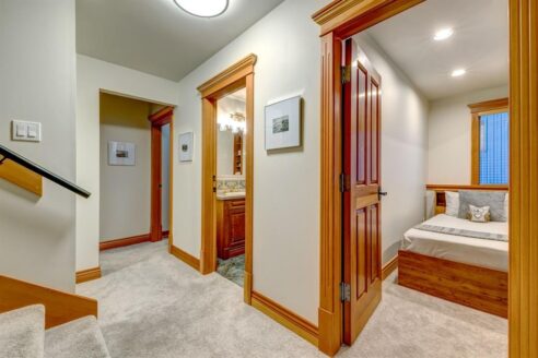 6361 Fairway Drive, interior and exterior views of this luxury log home.