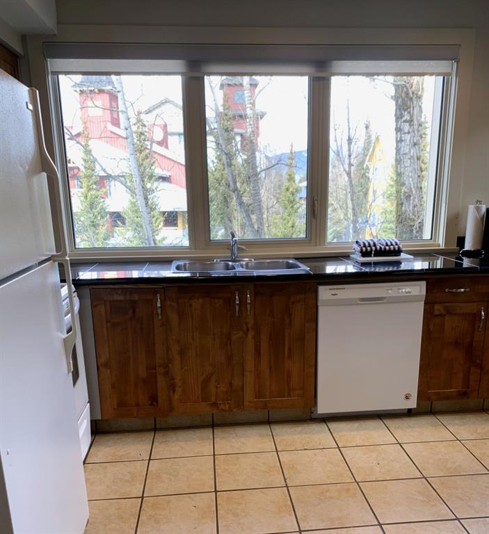 #202/302 – 4321 Village Gate Boulevard