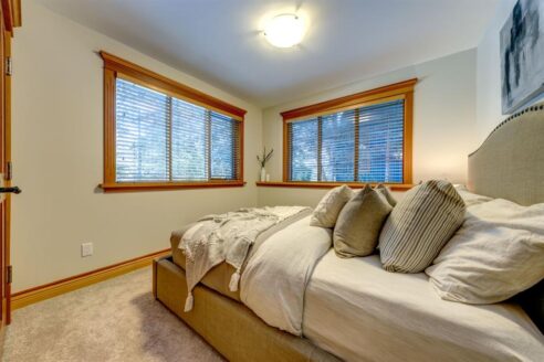 6361 Fairway Drive, interior and exterior views of this luxury log home.