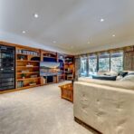 6361 Fairway Drive, interior and exterior views of this luxury log home.