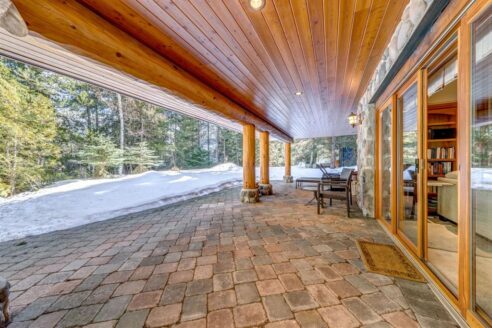 6361 Fairway Drive, interior and exterior views of this luxury log home.