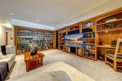 6361 Fairway Drive, interior and exterior views of this luxury log home.