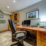 6361 Fairway Drive, interior and exterior views of this luxury log home.