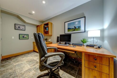 6361 Fairway Drive, interior and exterior views of this luxury log home.