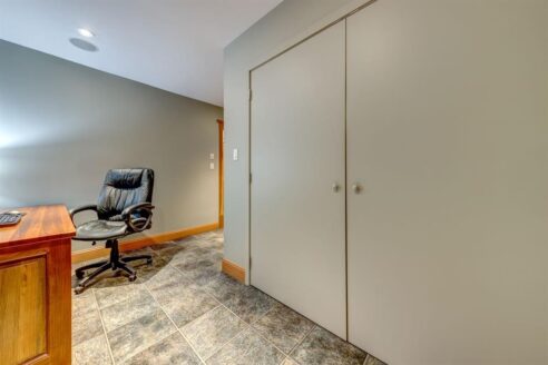 6361 Fairway Drive, interior and exterior views of this luxury log home.