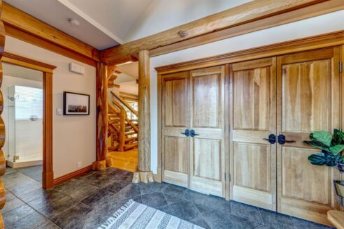6361 Fairway Drive, interior and exterior views of this luxury log home.