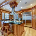 6361 Fairway Drive, interior and exterior views of this luxury log home.