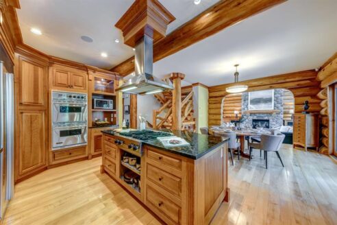 6361 Fairway Drive, interior and exterior views of this luxury log home.