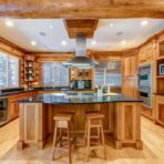 6361 Fairway Drive, interior and exterior views of this luxury log home.