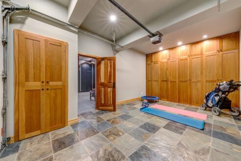 6361 Fairway Drive, interior and exterior views of this luxury log home.