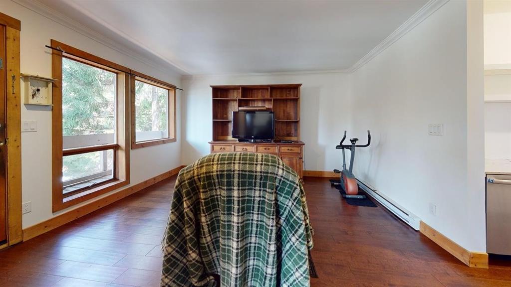 #100 – 6117 Eagle Drive