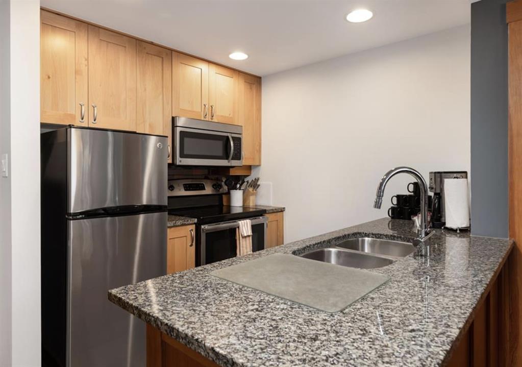 #220D – 2036 London Lane
