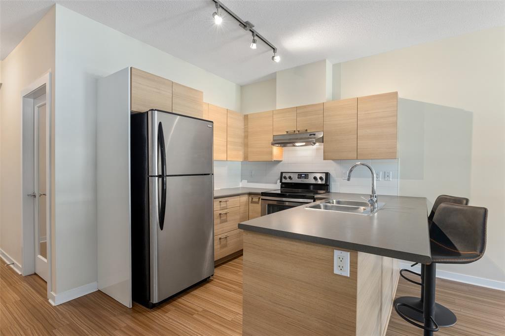#202 – 7445 Frontier Street