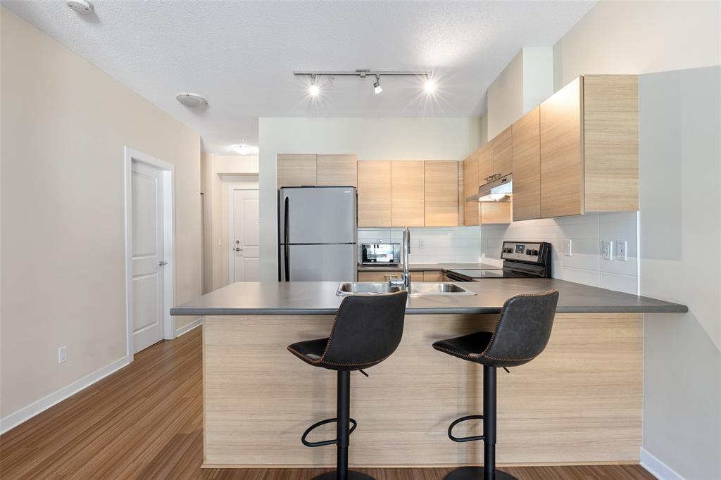 #202 – 7445 Frontier Street