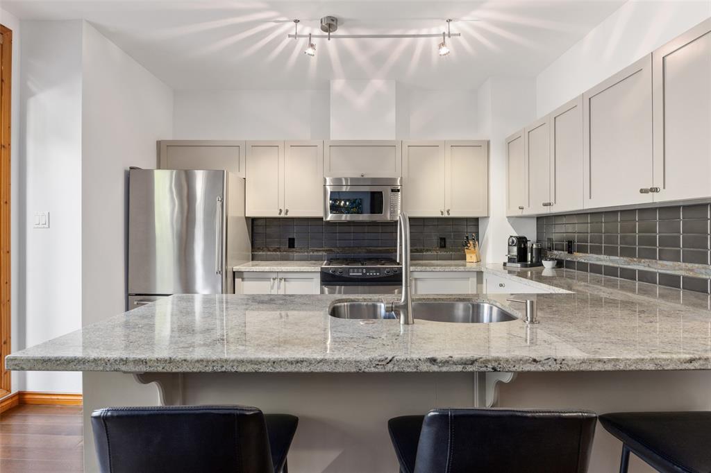 #21 – 8030 Nicklaus North Boulevard