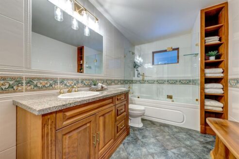 6361 Fairway Drive, interior and exterior views of this luxury log home.