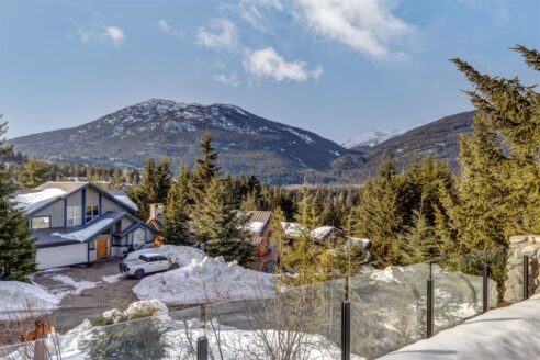 6361 Fairway Drive, interior and exterior views of this luxury log home.