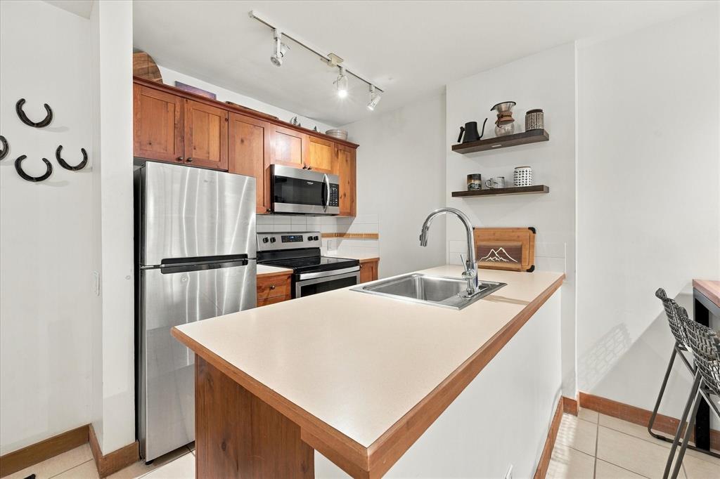 #318 – 4660 Blackcomb Way